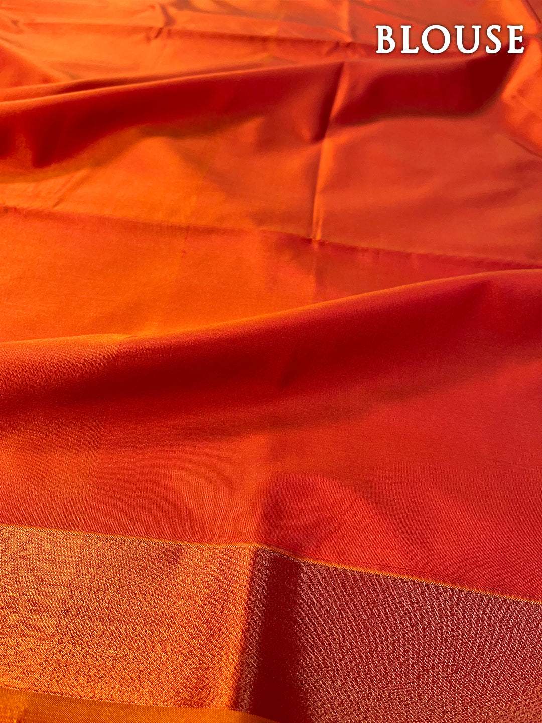 Dual color of grey and orange kanchipuram semi soft silk saree