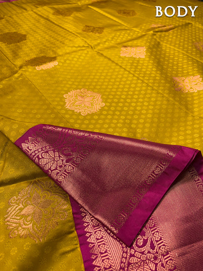 Mustard yellow kanchipuram silk saree