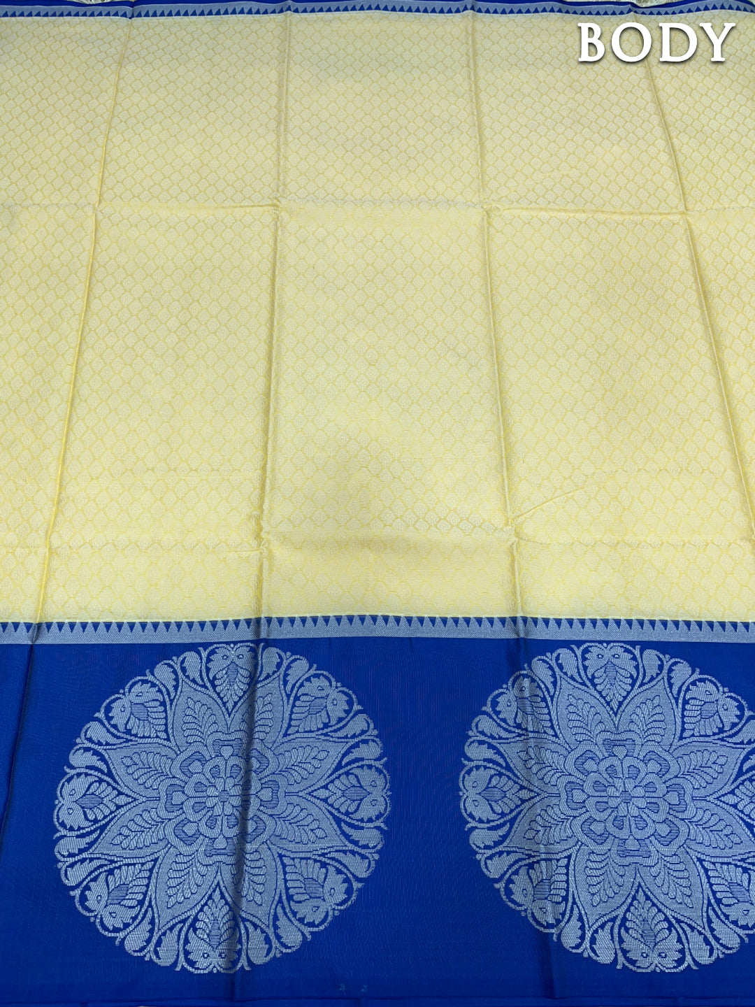 Cream banarasi kora muslin saree