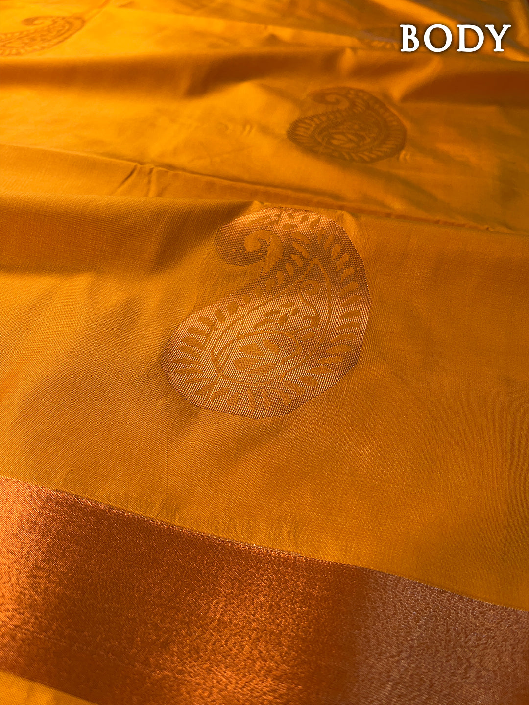 Dual color of mustard yellow and red kanchipuram semi soft silk saree