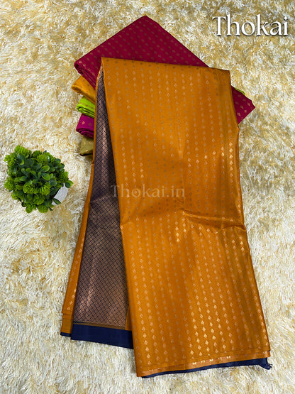 Mustard yellow kanchipuram soft silk saree