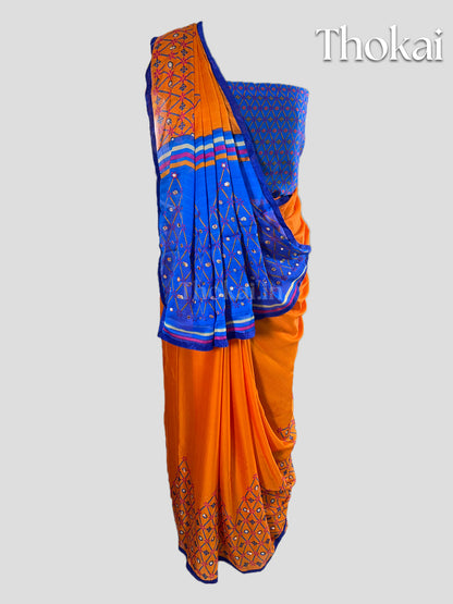 Orange and blue georgette saree