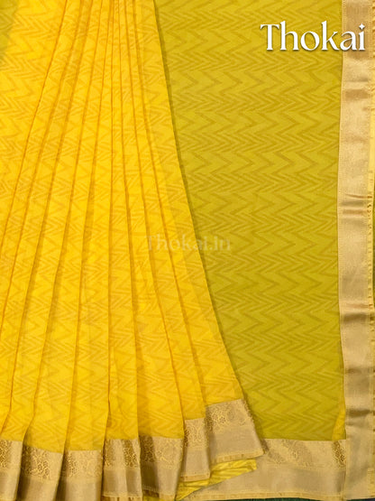 Yellow georgette saree