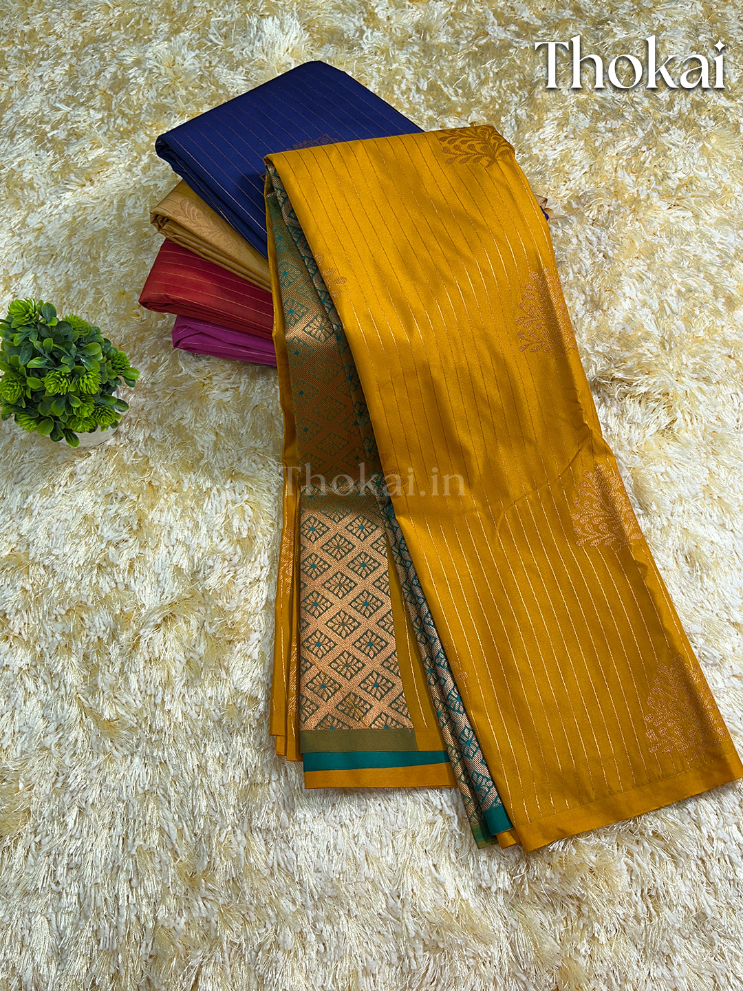 Mustard yellow kanchipuram soft silk saree