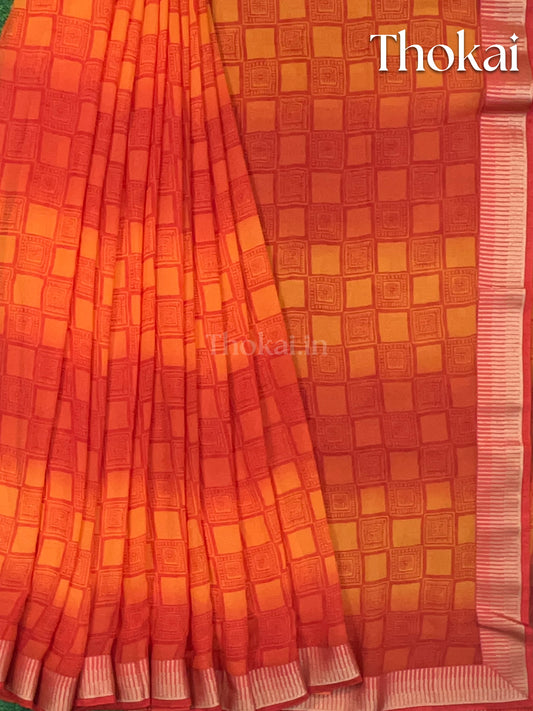 Red and yellow georgette saree