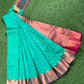 Dual shade of turquoise and beet red semi silk saree