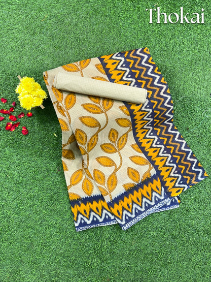 Cream and mustard yellow printed cotton saree