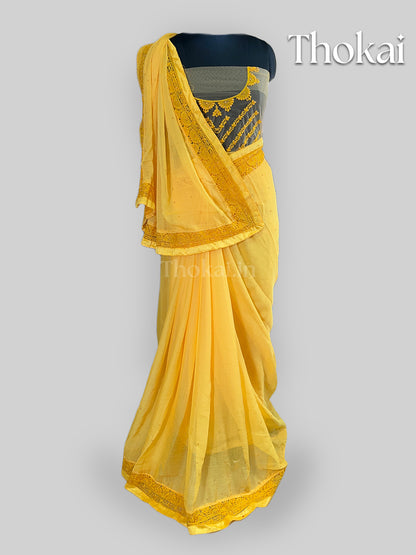 Yellow chiffon saree