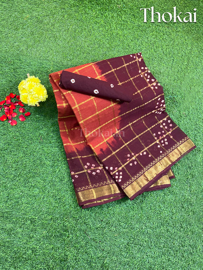 Orange and maroon cotton saree with handmade bandhini