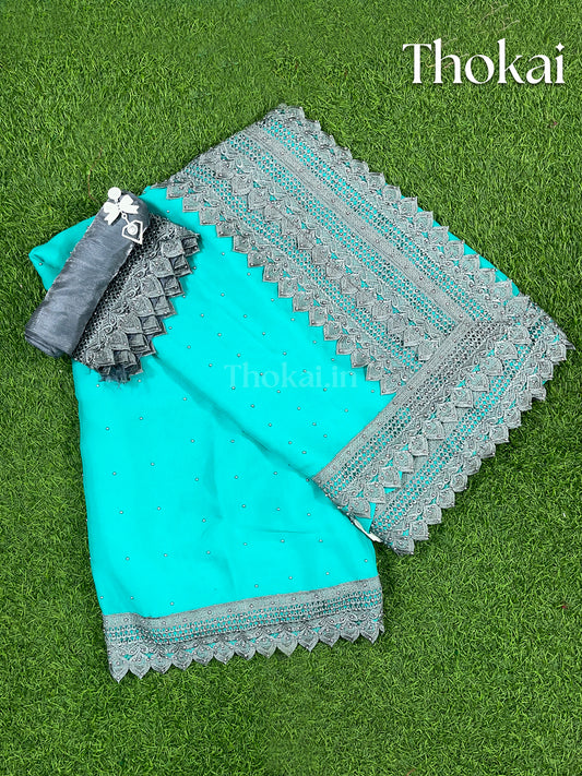 Turquoise blue satin silk saree