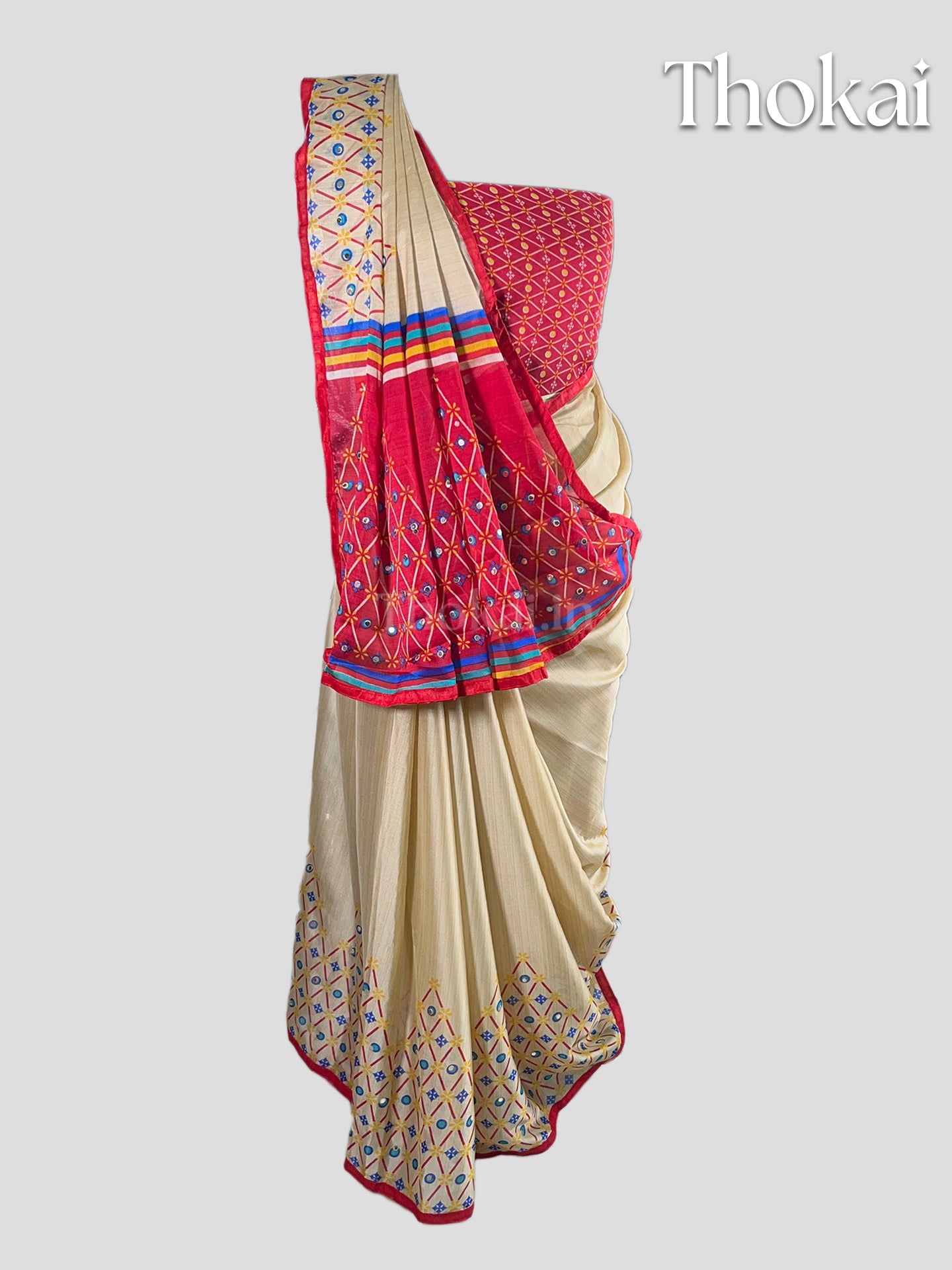 Cream and red georgette saree