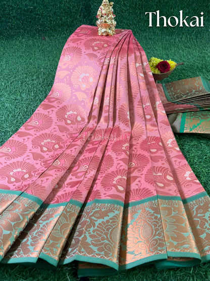 Dual shade of peach and green semi silk saree