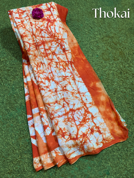 Orange and white narumughai cotton saree