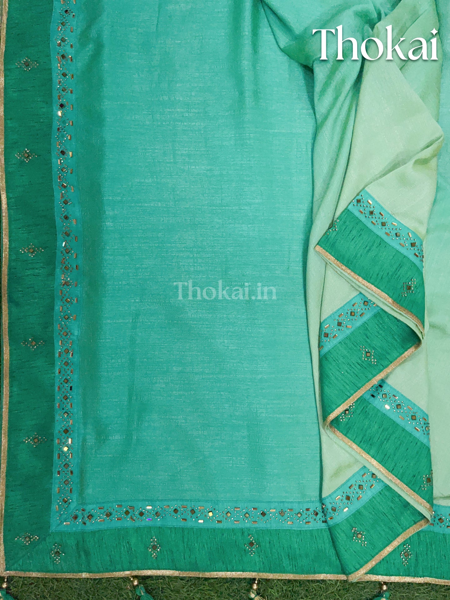 Dual shade of green satin silk saree