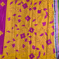 Mustard yellow and pink georgette saree