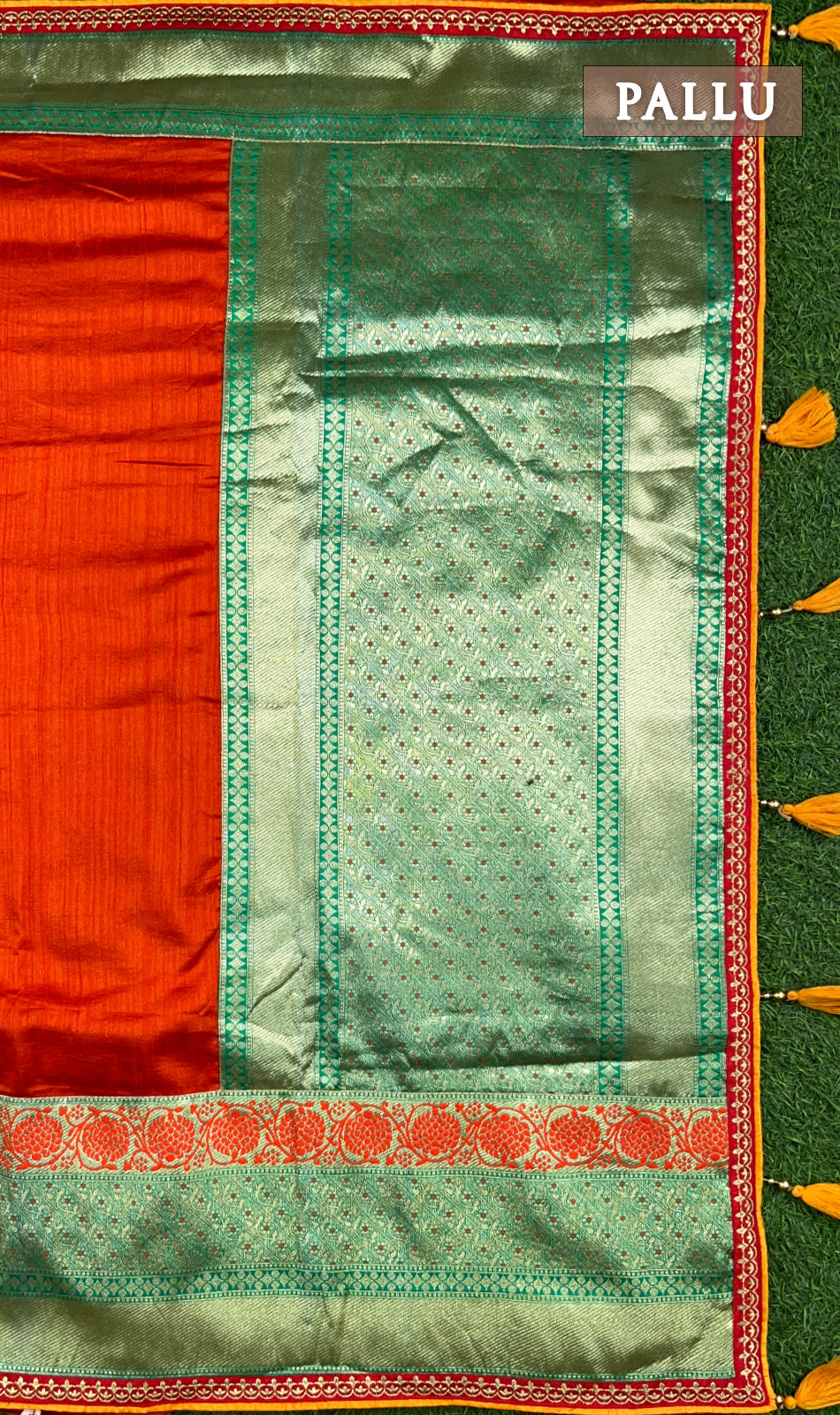 Orange and green raw silk saree