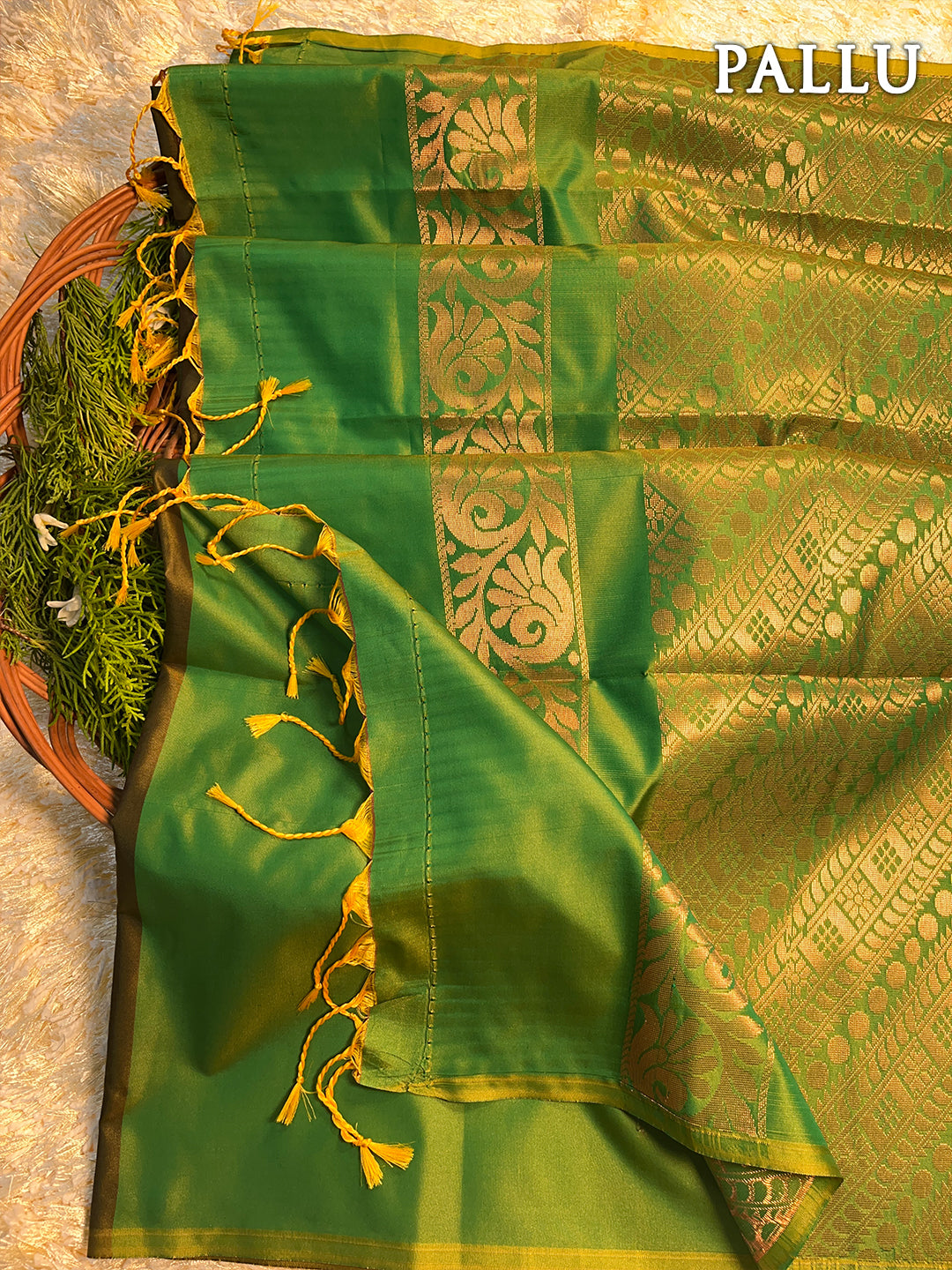 Dual color of henna green and green kanchipuram semi soft silk saree